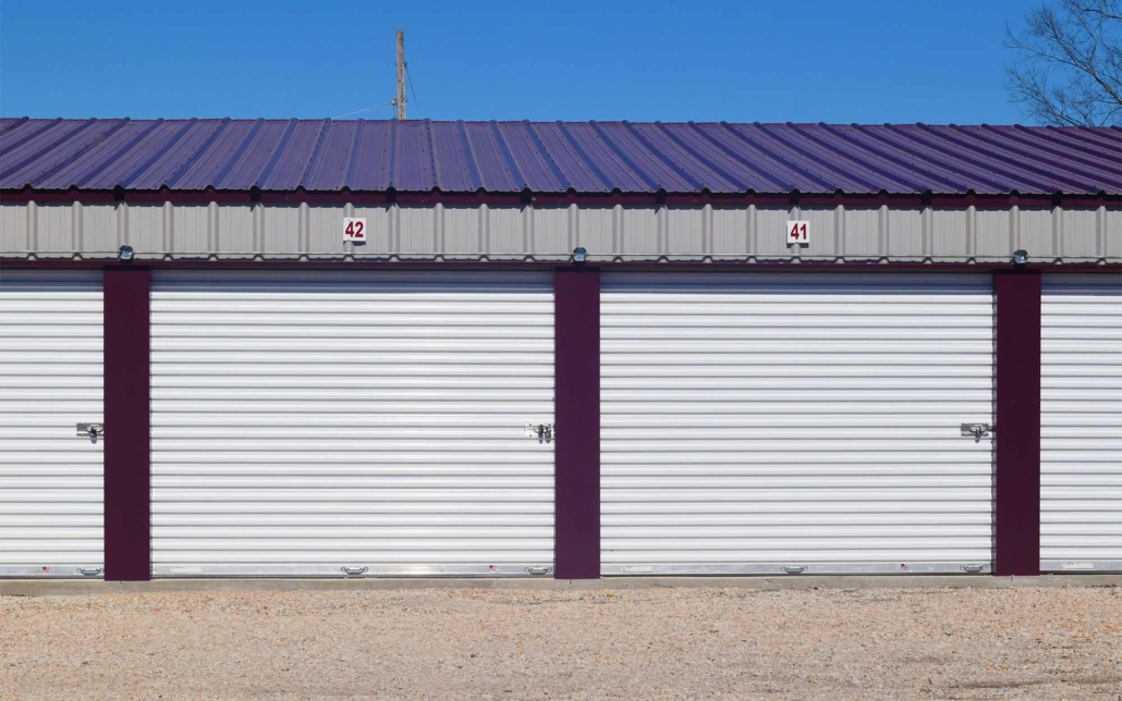 Side view of a metal red and white storage units