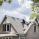 home with a caved in roof due to severe storm damage