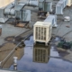 Top view of commercial roof with substantial water damage