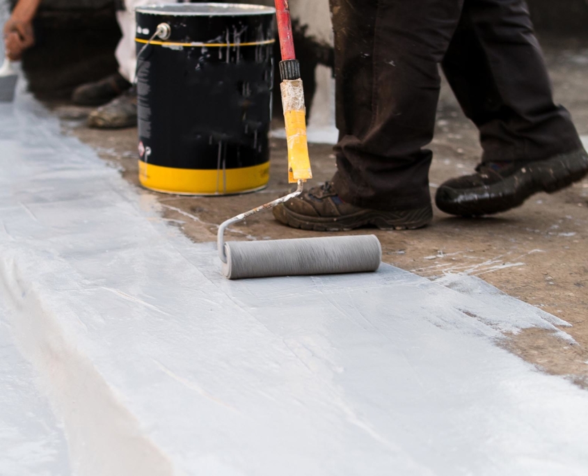 Close up view of a silicone roof coating roller